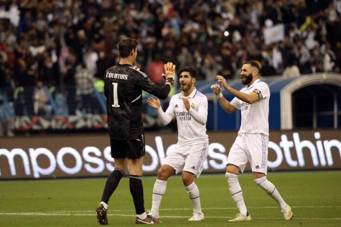 Asensio y Benzema felicitan a Courtois